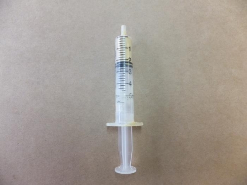 Syringe with body filler.