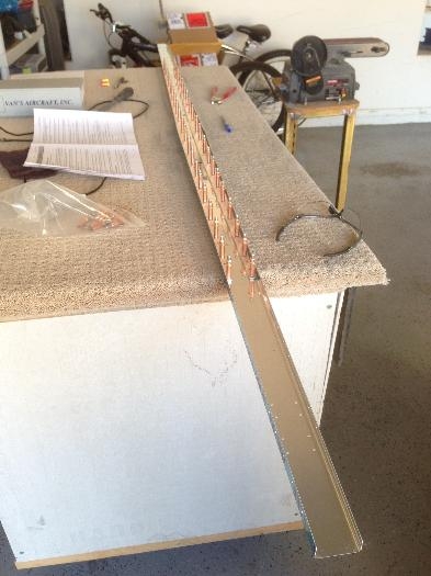 Making sure they fit flat within the rear spar channel