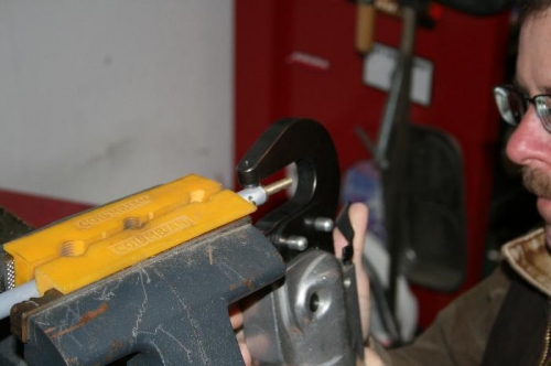 Squeesing in a -11 rivet. Clamping into a vise is also a must.