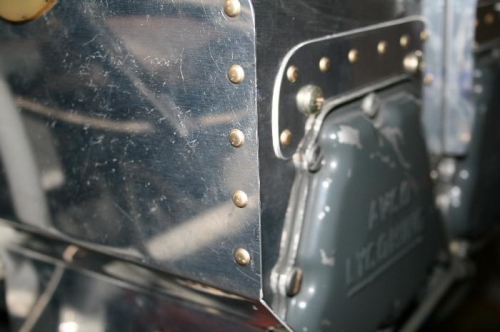 vertical row of rivets