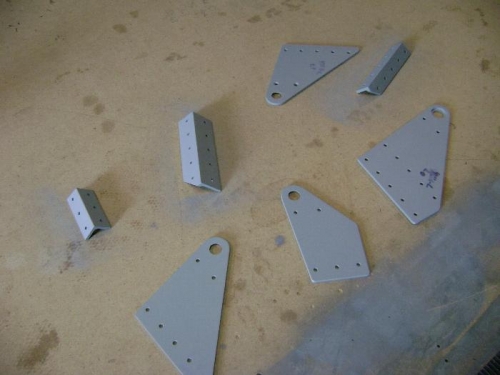 Left wing aileron brackets are primed and ready.
