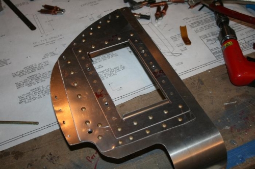 Extra doublers riveted on along with the nutplates