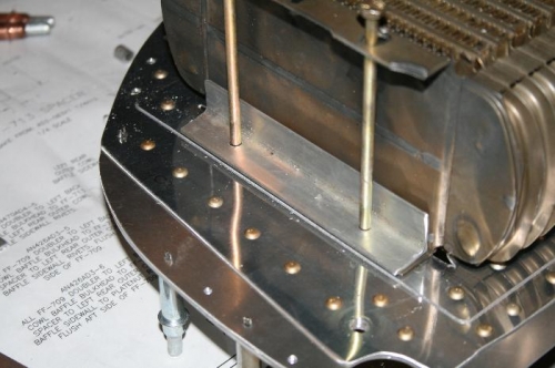 Alum angle to reinforce the mounting tabs and spread the load