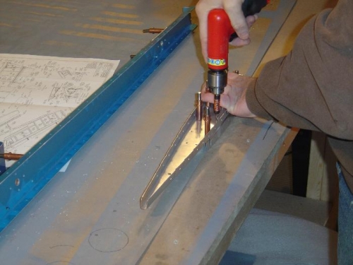 Match-drilling the end counter-weight ribs