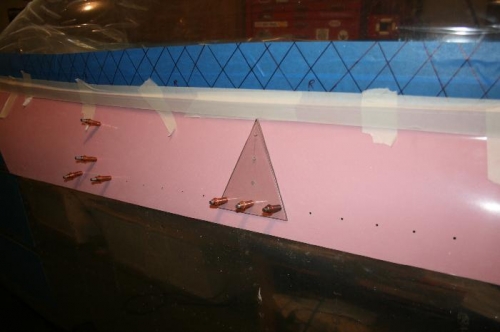 Using the template to drill the rib holes (the vertical ones)