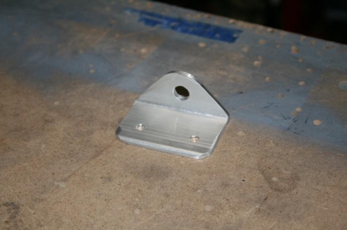 Control mount bracket that started at raw aluminum angle. It's drilled and ready to go.