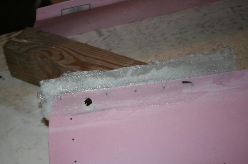 Slurry applied to the buildup on the left side of the skirt