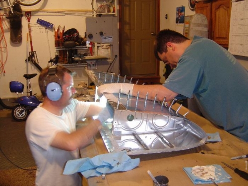 MIke is on the gun and I'm bucking. The riveting is the fast and easy part. The prep and cleanup arent