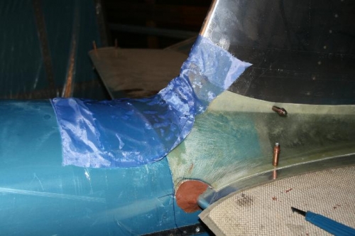 Upper center part of the fairing layed up and curing out with peel ply (blue stuff)