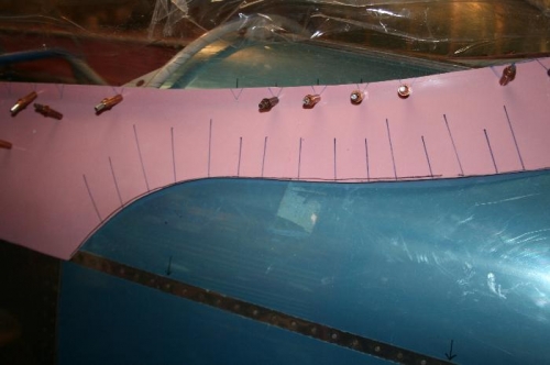 Lines where I plan to carefully and iterativly slice the skirt to get it down on the fuselage.