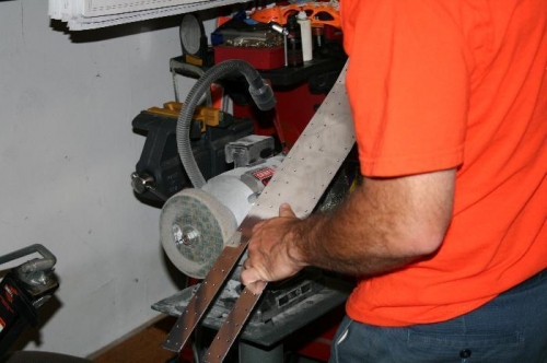 Edge deburring one of the center section webs with the 3M wheel - makes it go fast.