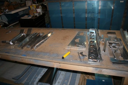 The pile on the left needs dimpled, the right is ready to prime, the skins and longerons are elsewhere