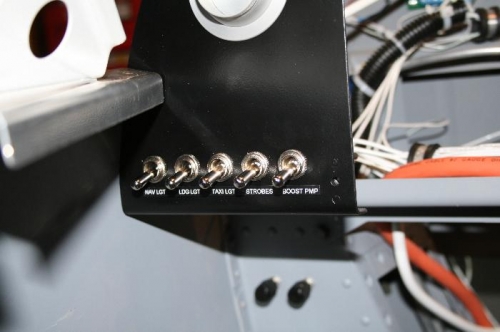 Left subpanel switches (nav, taxi lgt, ldg lgt, strobe & boost pump)