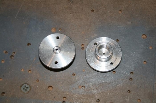 Holes drilled in the flanges of the static ports.