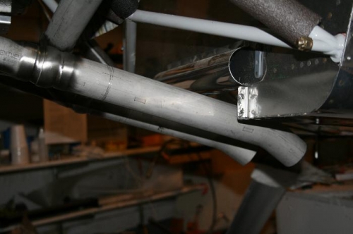Turn down tips lesson the impact of the exhaust pulses on the cooling ramp and bottom skin
