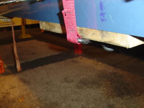 Layed a 4x4 under the rear spar so the straps would clear the skins as they hang past the rear spar.