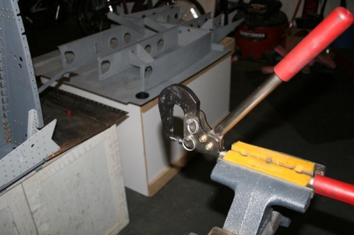 Putting the squeezer in the vise works great for dimpling.
