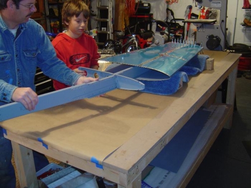 Installing the spar assembly into the left hand horizontal stabilizer skin