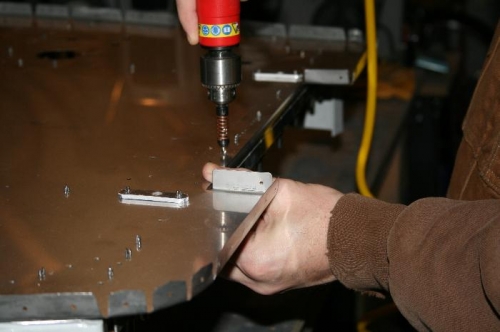 Match drilling the firewall to the bracket underneath from the front or forward facing side of the fw.