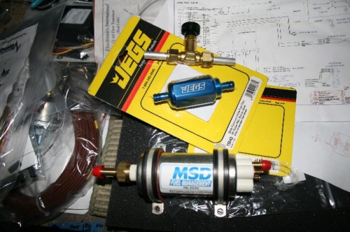 Flow restrictor valve, filter and pump