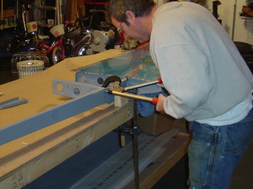 Riveting (squeezer) the inboard ribs to the front spar on the right hand stabilizer