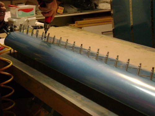Match drilling the nose skin, main skin, and spar.