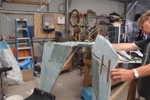 Peer into the cavity, grind off where it touches, repeat.