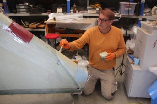 Wetting out the peel ply tapes