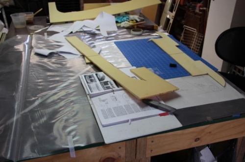 Cutting out the foam. Template under the plastic