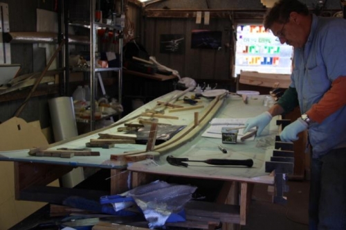 On with the lower longeron