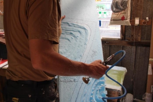 Smoothing router cuts with rotary wire brush