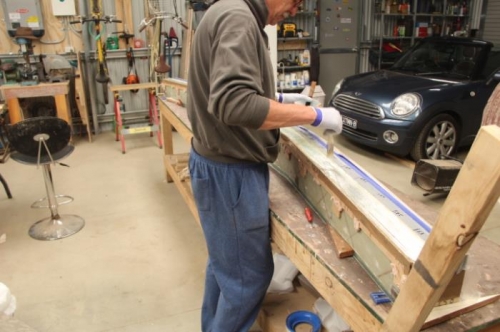 Painting the trough with raw epoxy