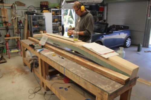 Screwing mounting boards to the access hole cutout location