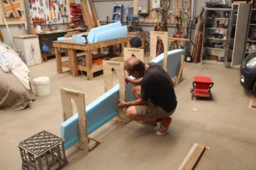 Fixing upper surface of wing to jig using glue blocks
