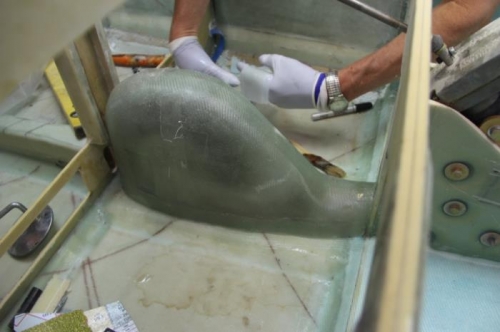 Taping on the Cover, showing plug removal damage...