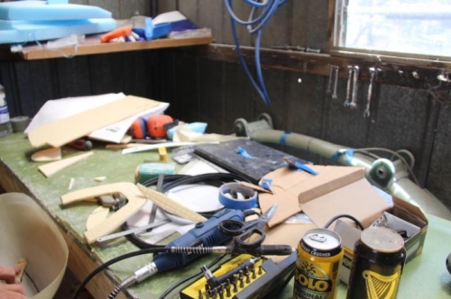 Playing with foam and cardboard and cans of lead