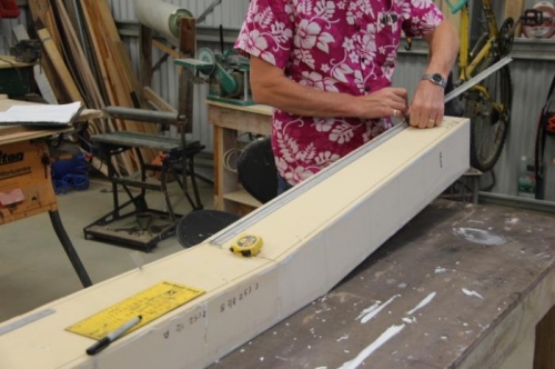 Marking, marking. Not the usual workshop clobber. New Island workstation in the background...