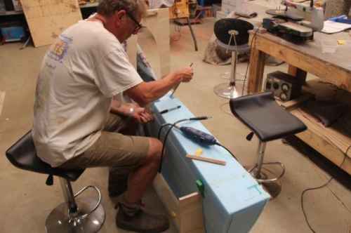 Using a jig to cut a drain line