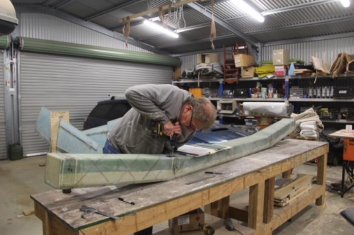 Drilling pilot hole through a mirror