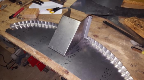 Basic folded stainless steel components.
