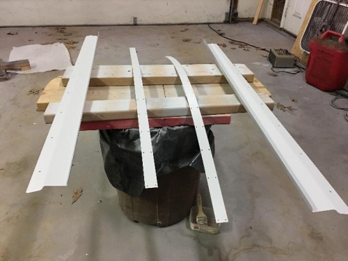 Primed mating strips and wing root panels