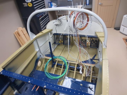 Wires run to the front of the aircraft