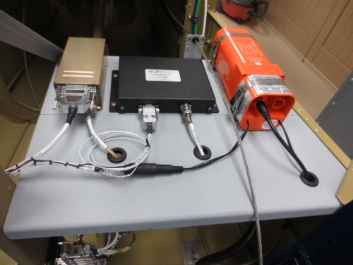 Avionics rack behind baggage bulkhead