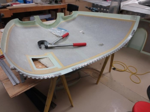 Hinges glassed and riveted