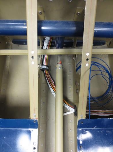 Wiring through center tunnel