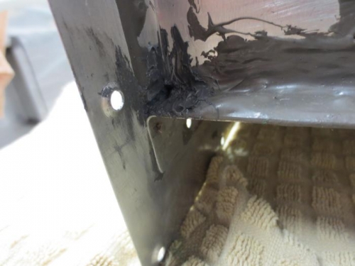 Leak in ProSeal on bottom of outboard rib on left tank