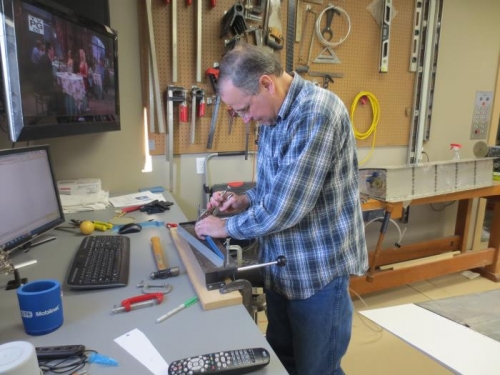 Fabricating front spar covering