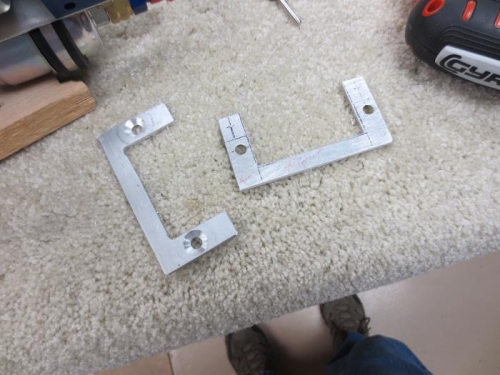 Two fuel pump brackets