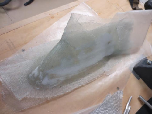 Upper left gear fairing with additional fiberglass