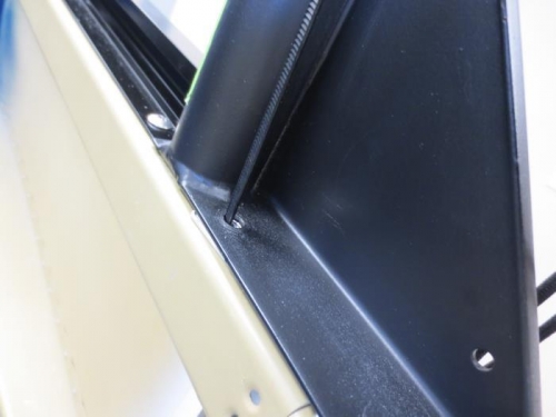 Inserted the zip tie from the bottom